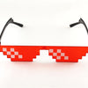 Red sunglasses with a white pixel mosaic pattern and black frames.