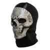 Mascarilla táctica negra de silicona con diseño de calavera desgastada.