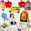 A set of six foil balloons shaped like a school bus for back-to-school celebrations.