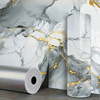 Roll of marble pattern self-adhesive wallpaper featuring gray and white marble veins with gold accents