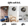 A black and gold marble textured glass wall clock displayed in various indoor and outdoor settings.