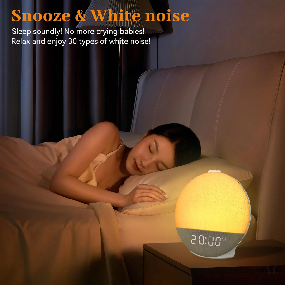 A woman is sleeping in bed next to a Sunrise Alarm Clock emitting soft light and white noise.