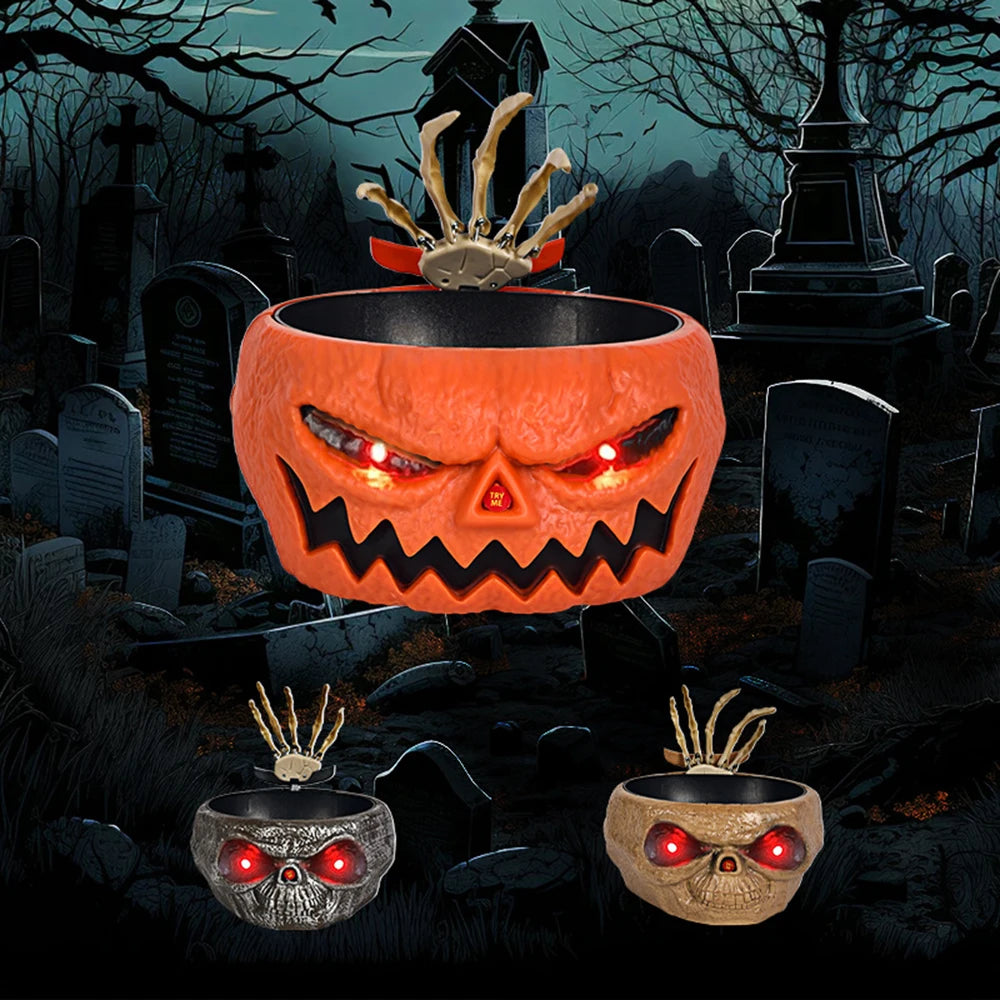 An orange carved pumpkin bowl with jagged teeth and eyes sits on a graveyard setting.