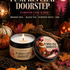 A set of pumpkin chai doorstep candles featuring orange peel, black tea, pumpkin spice, and oak scents.