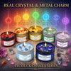 A set of seven Evoduck chakra scented candles featuring real crystals and metal charms in various colors.
