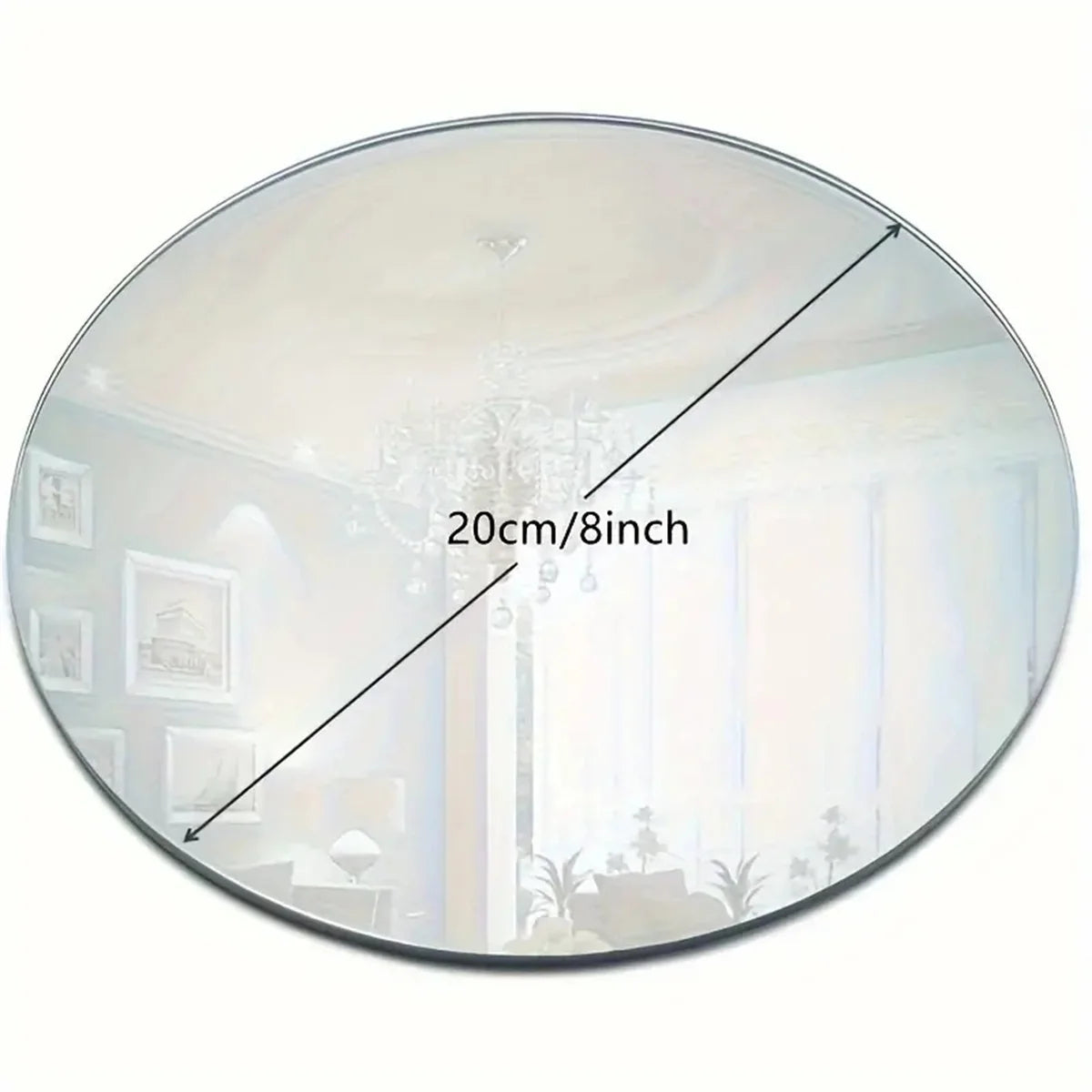 Round acrylic mirror showing a room interior with a chandelier and light.