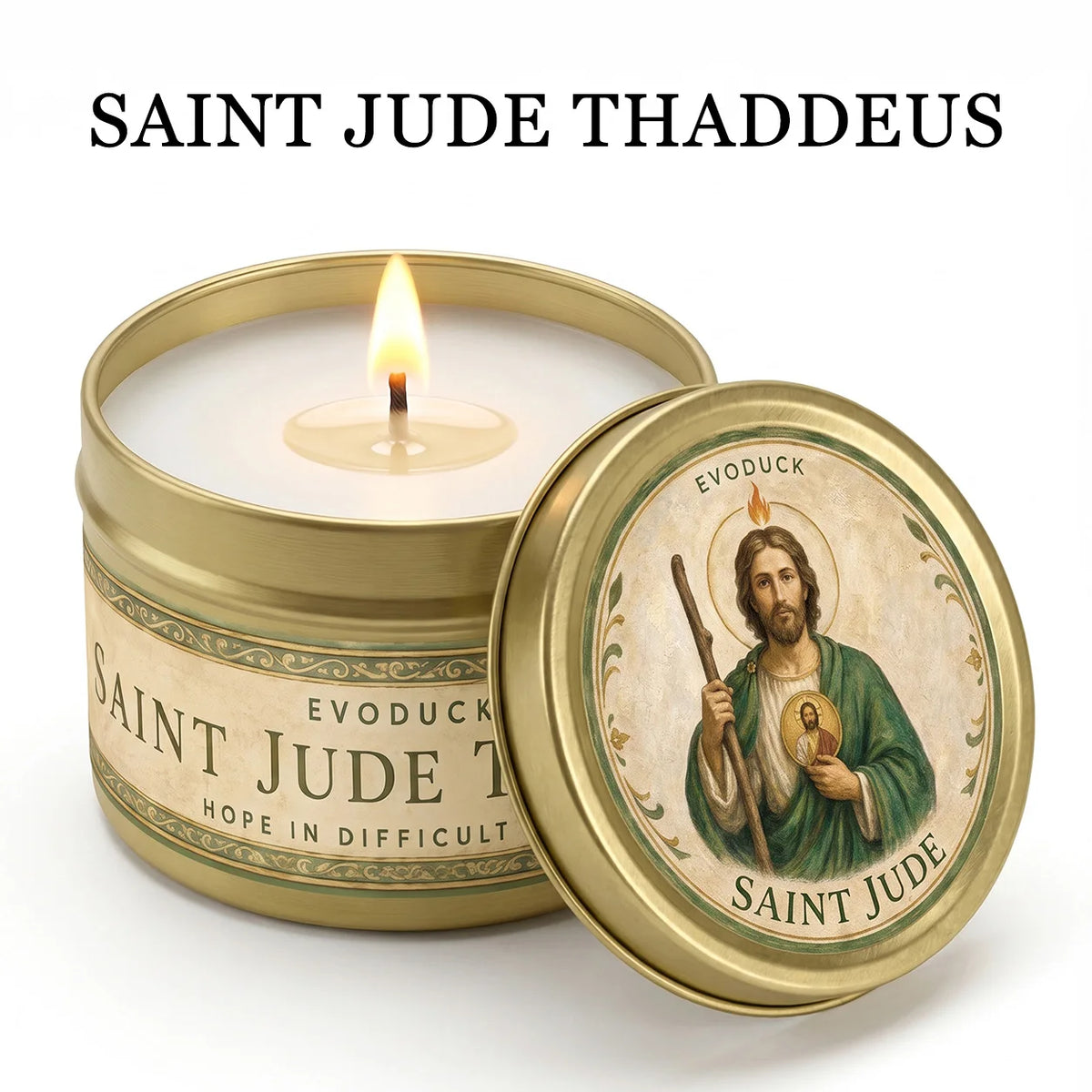 A gold tin candle labeled Saint Jude Thaddeus with a lit wick and a decorative label featuring the saint.