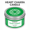 A jar of Heart Chakra candle labeled Evoduck with a green lid and a decorative chakra symbol.