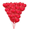 A bunch of shiny red heart-shaped foil balloons for celebrations