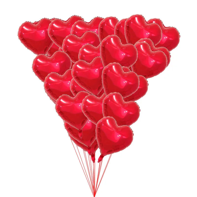 A bunch of shiny red heart-shaped foil balloons for celebrations