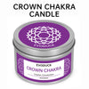 A silver tin of Crown Chakra candle with a purple label featuring a mandala design.