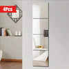 Four self-adhesive acrylic mirror tiles used as flexible decorative wall stickers.