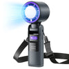 A handheld cooling fan with a circular LED light and a black strap is shown against a white background.