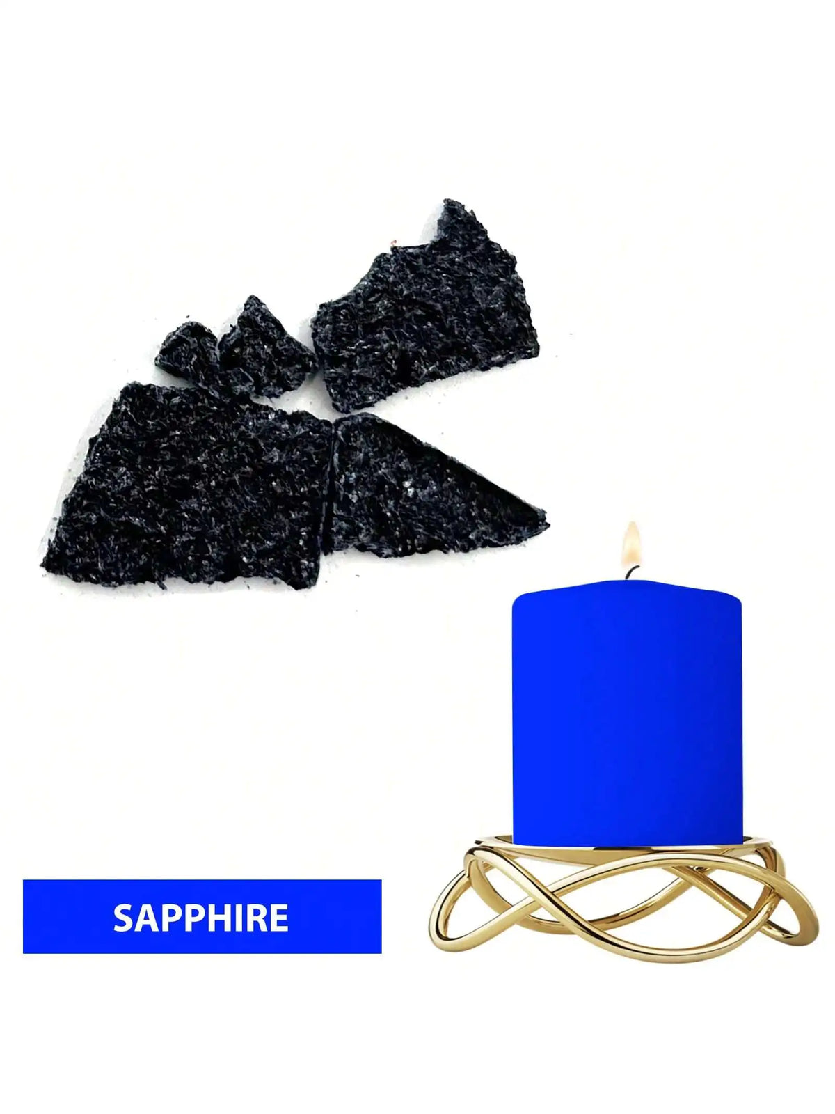 A blue candle in a gold holder next to black sapphire dye blocks.