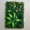 Artificial green plant wall panel featuring realistic 3D foliage and various green leaves