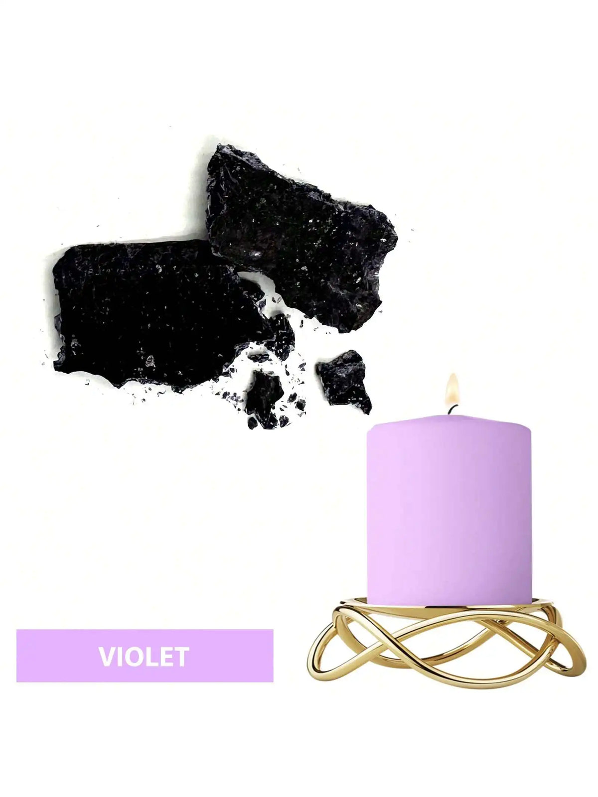 A purple candle in a gold wire holder next to black dye blocks.