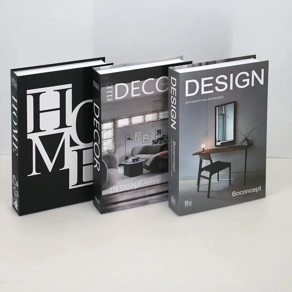 A set of three modern decorative fake books titled Home Decor Design and Design Concept on a white surface.