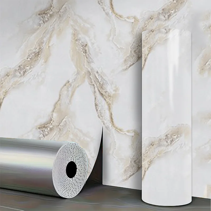 Roll of marble pattern self-adhesive wallpaper next to a vertical tube.