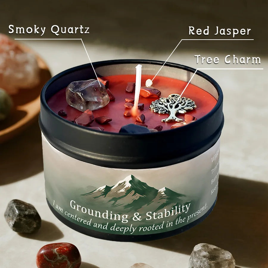 A dark candle jar filled with red wax and various crystals including Smoky Quartz, Red Jasper, and Tree Charm.