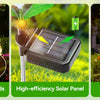 A set of four solar-powered LED flower lights illuminating delphinium flowers in a garden.