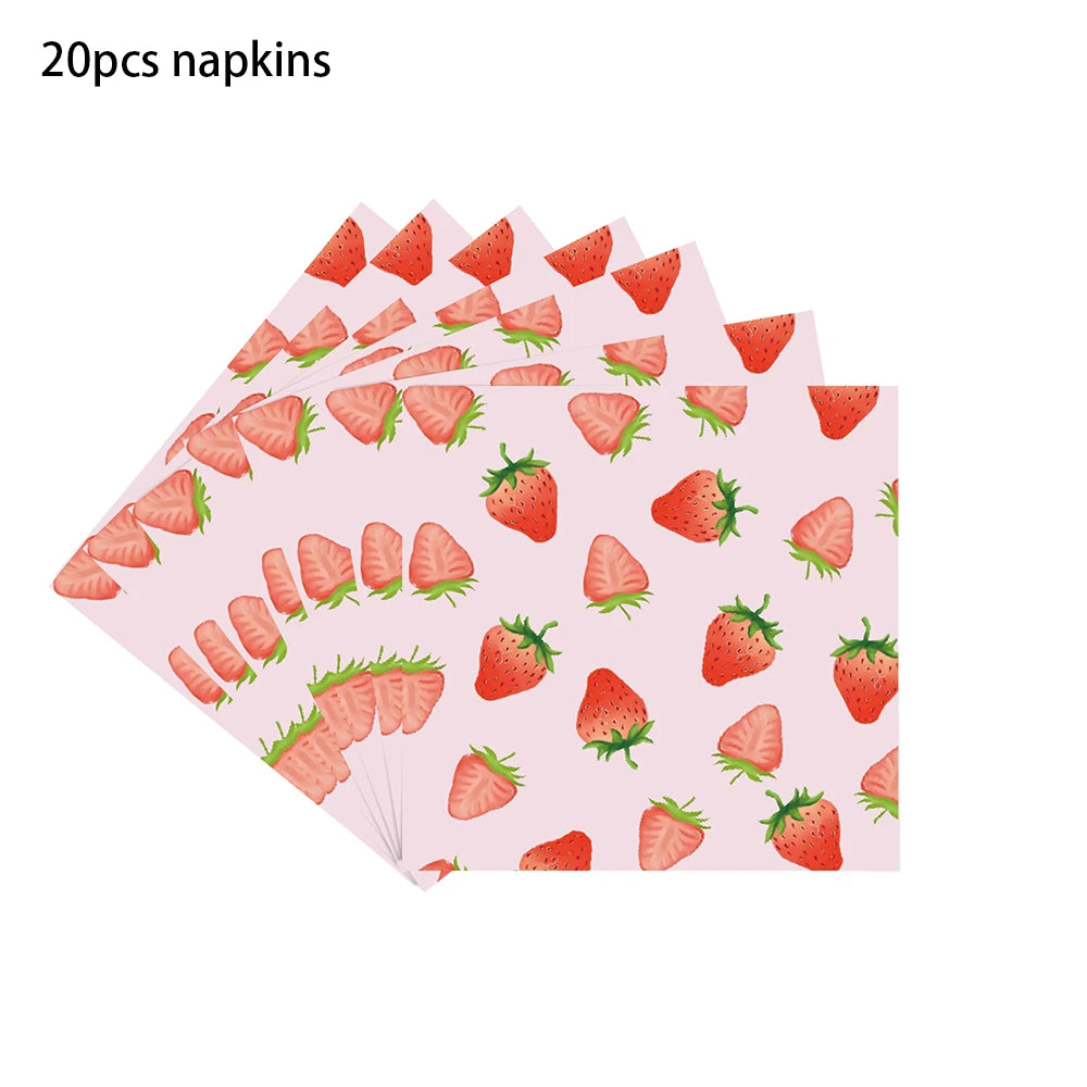 A collection of pink and red strawberry-themed napkins arranged in a fan shape.
