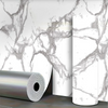 Roll of marble pattern self-adhesive wallpaper against a white background.