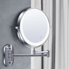 A round chrome magnifying makeup mirror is mounted on a wall with a silver arm.