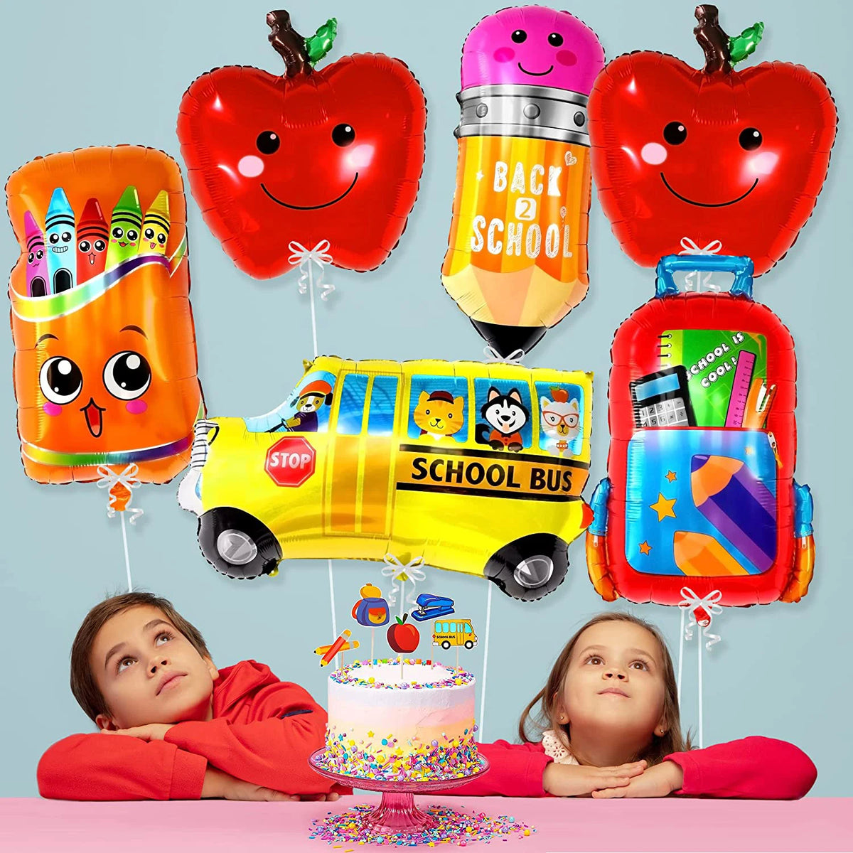 A set of six foil balloons shaped like apples and a yellow school bus for back-to-school celebrations.