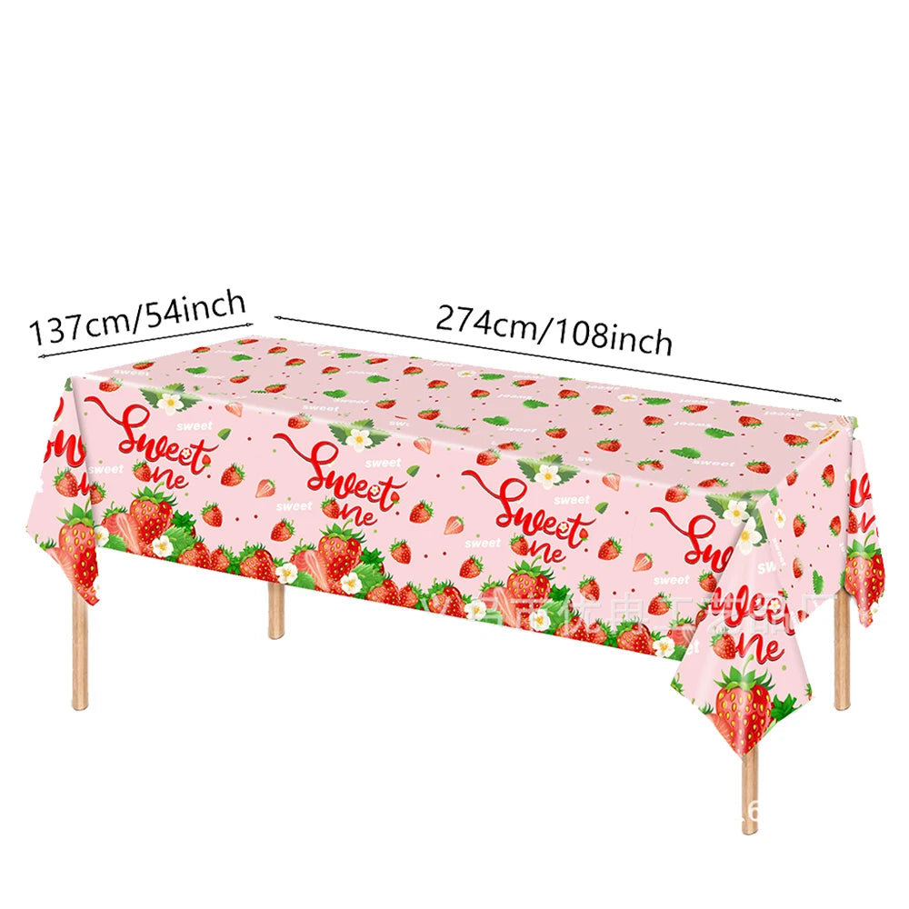 Pink strawberry themed tablecloth measuring 137cm/54inch for a party setup.