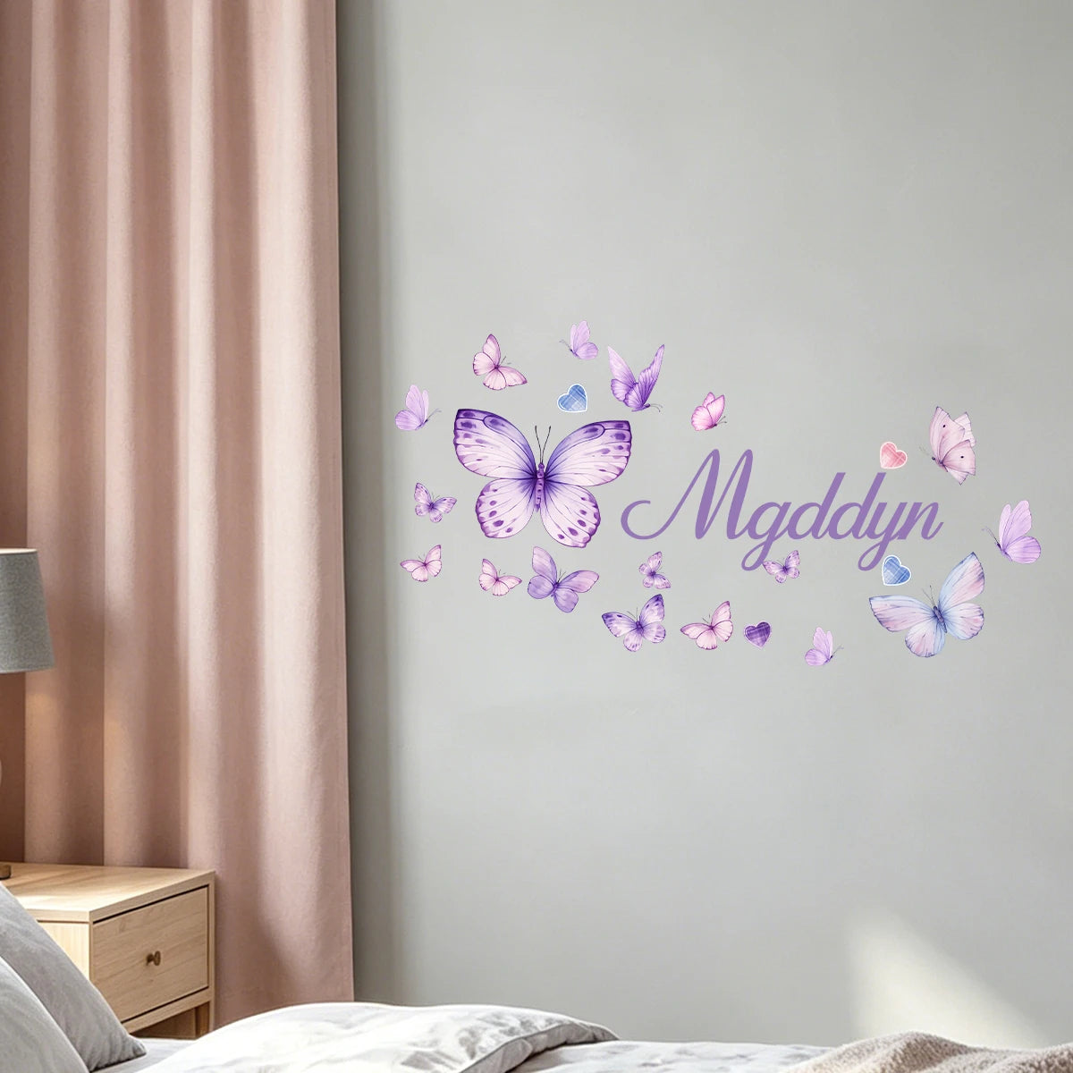 Watercolor butterfly name wall sticker featuring purple and pink butterflies spelling the name Mgddyn