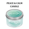 A jar of Peace & Calm candle with a light blue tint and a silver lid.