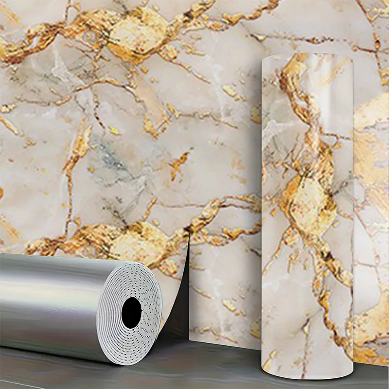 Roll of marble pattern self-adhesive wallpaper featuring gold veining on a light beige background
