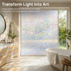 A bathroom scene showing a window covered with rainbow holographic privacy film, bathing the space in soft light.
