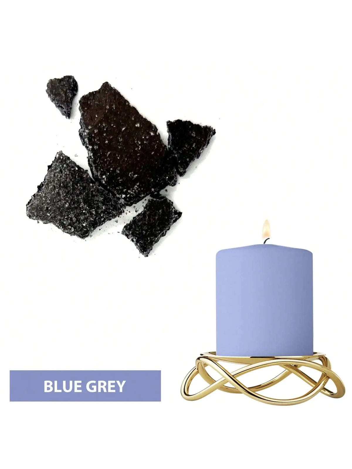 A blue grey candle in a gold wire holder next to black and grey dye blocks.