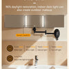 A wall-mounted mirror with a light fixture and a smart switch demonstrating various light settings.