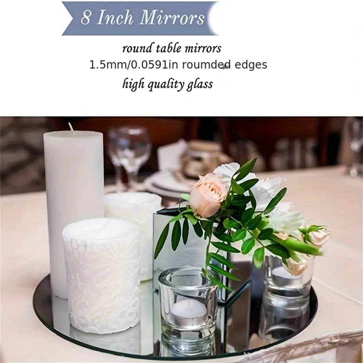 Eight inch round mirrors with rounded edges displayed on a glass plate surrounded by candles and flowers.