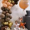 A set of woodland animal foil balloons including a deer and other animals for a birthday party decoration.