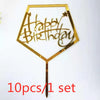 A set of ten gold acrylic love happy birthday cake toppers with a star design on a stick.