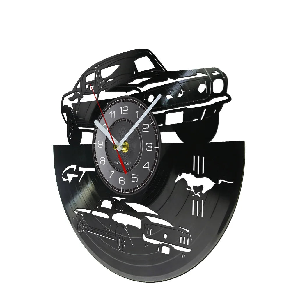 A black vinyl record sports car wall clock featuring a silhouette of a classic car and a race car above the clock face.