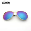 Classic gold-rimmed pilot sunglasses with iridescent blue and purple mirror lenses