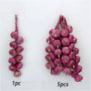 A cluster of artificial purple fruits or vegetables, shown individually and in a group of five.