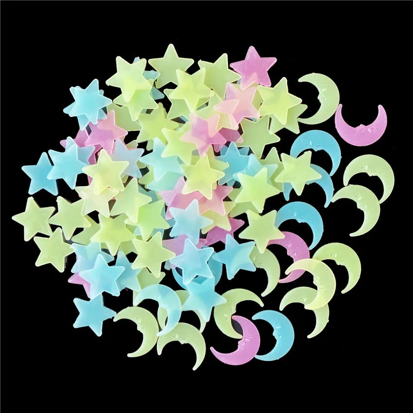 A collection of glow-in-the-dark star and crescent moon wall stickers in various pastel colors.