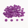 A pile of assorted purple snap buttons, measuring 12mm and 10.5mm, for crafting.