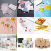 A collection of clear cellophane gift bags with gold twist ties in various pastel and neutral colors.