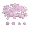 A pile of assorted pink snap buttons, including 12mm and 10.5mm sizes, for crafting.