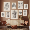 A gallery wall featuring vintage human anatomy drawings and illustrations on canvas prints.