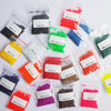 Assortment of vibrant, finely ground eco-friendly soy candle dye colorants in various shades including red, orange, green, bl