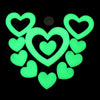A set of glow-in-the-dark heart shapes in green, shaped like a star and moon.