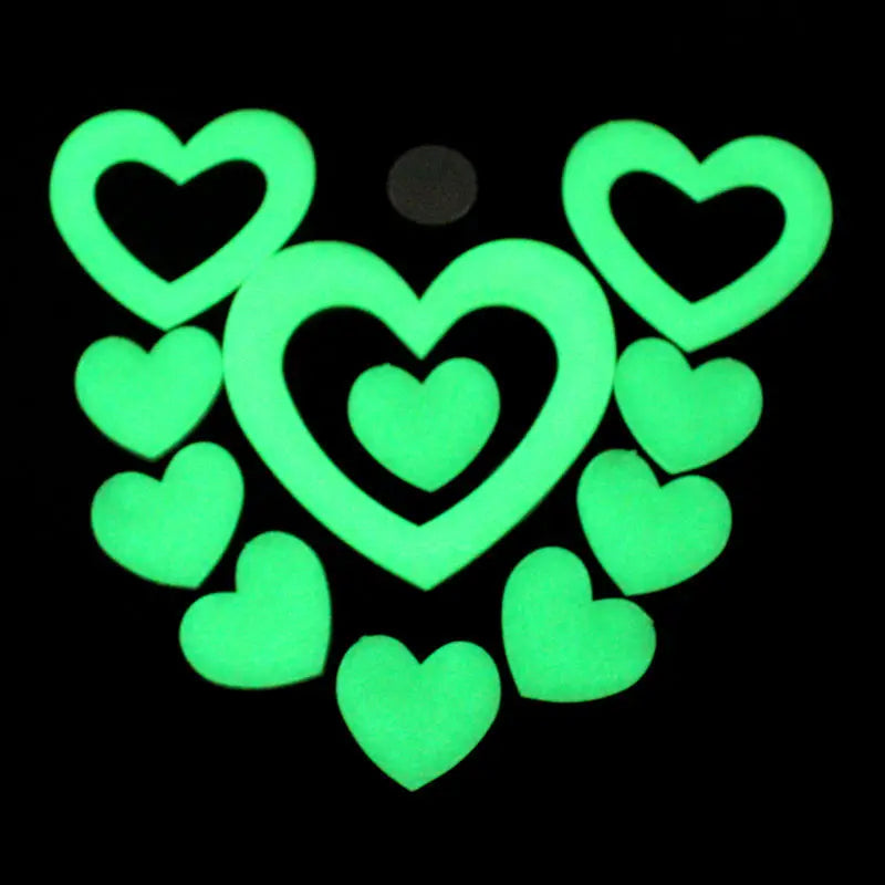 A set of glow-in-the-dark heart shapes in green, shaped like a star and moon.