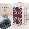 A stack of books featuring a Union Jack design next to a combination lock and a dried flower.
